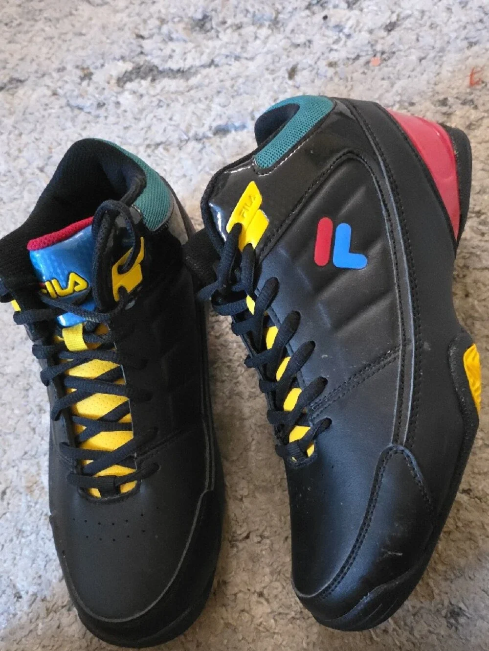 FILA Black High-Top Sneakers with Yellow and Blue Accents